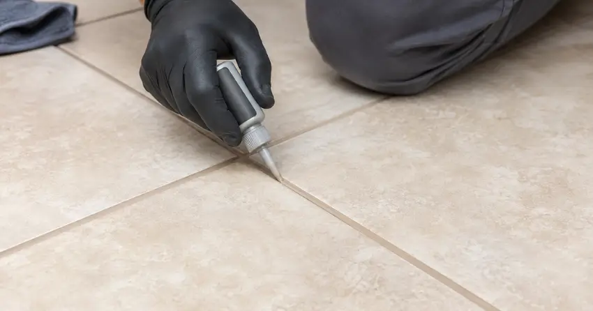 grout color sealing service being applied to floor tile in Winnipeg